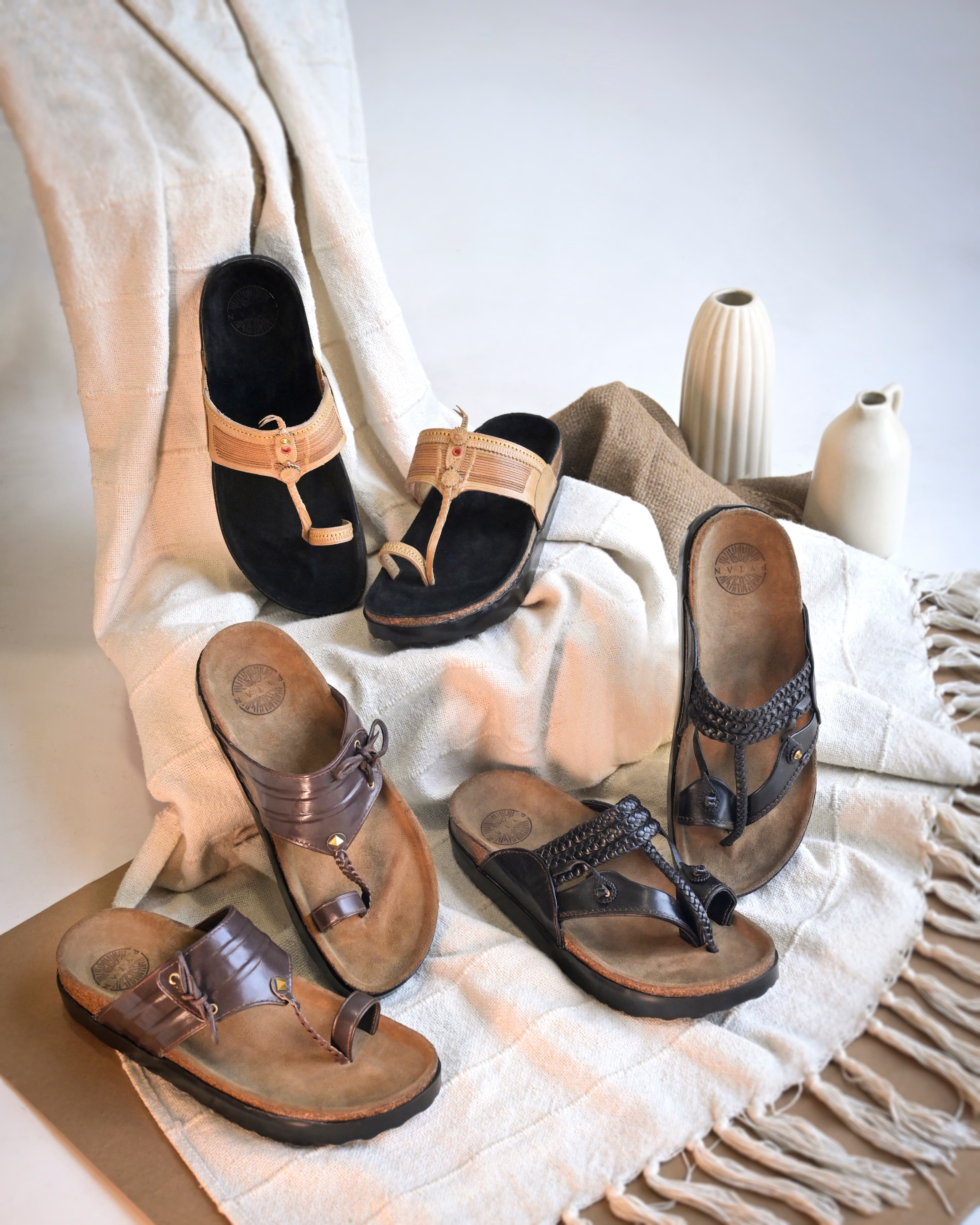 Curated arrangement of Pytan handcrafted sandals